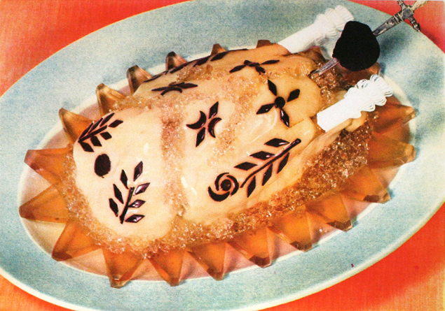 Damien Berthier’s 1968 photograph of Poularde a la Néva illuminates the dish’s winning combination of chicken gelée, chicken medallions, foie gras mousse, and sauce chaud-froid. The nineteenth-century Russian dish, named for the Neva river in St. Petersburg, was adopted by French haute cuisine.