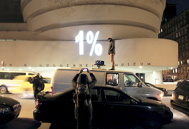 An illumination action targets the facade of the Guggenheim Museum on March 24, 2014.