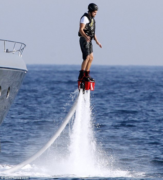 Leonardo DiCaprio blasts above the ocean on a jet pack in Ibiza, Spain on August 7, 2013. Photo: Goffphotos.com.